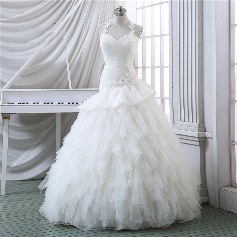 Lace Appliques Tulle Tie-halter Sweetheart Floor Length Ruffled Wedding Gown Featuring Lace-up Back